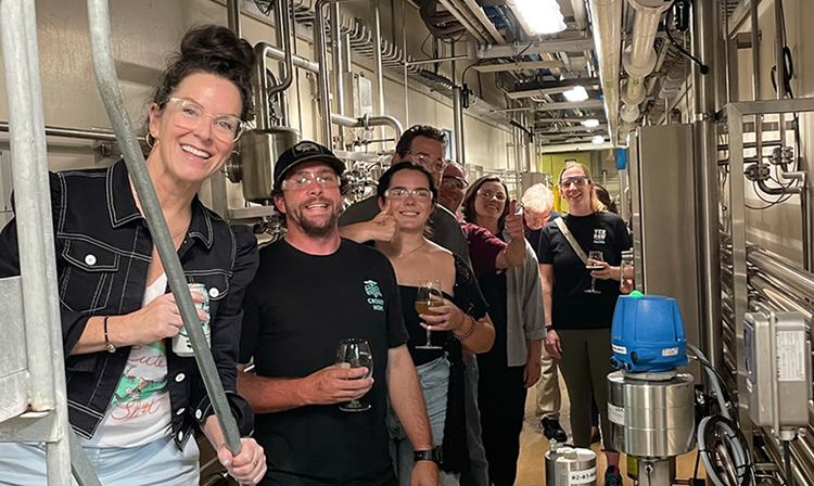 Members at a Brewery