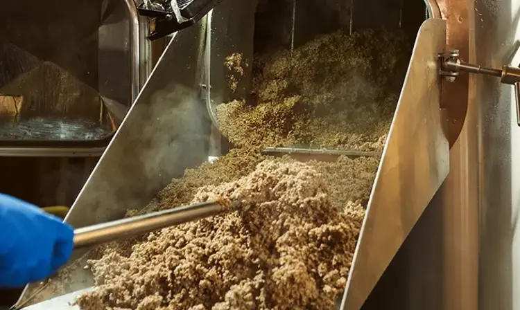 a machine with brown substance inside